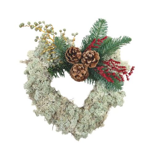 Gravsmyckning med dekorativa blommor och grönska