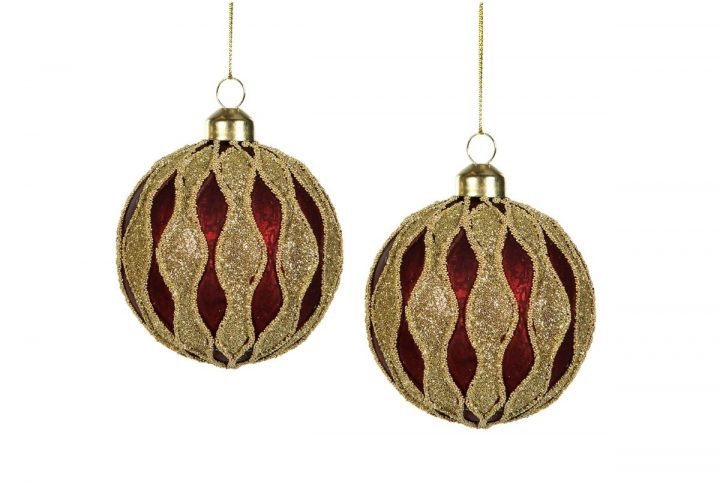 Julgranskulor med böljande glitterränder.