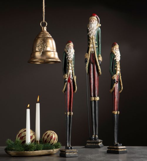 Julgranskulor med böljande glitterränder.